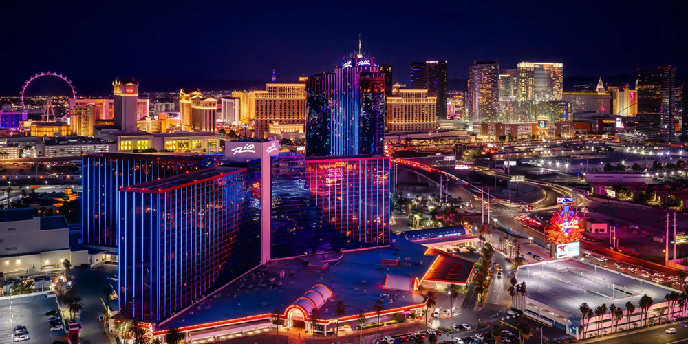 Rio-Las Vegas Colorful photo of the Rio Las Vegas Hotel and surrounding area at nighttime.