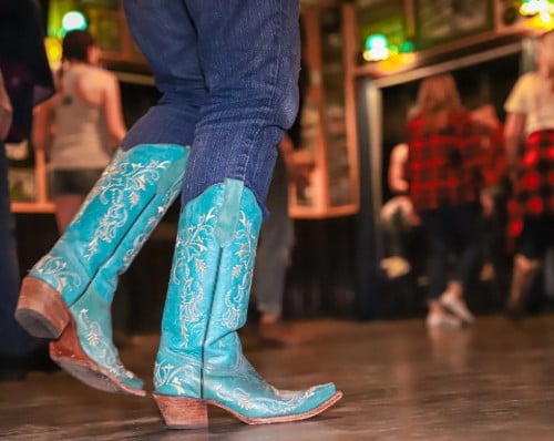 Cowboy boots close up of someone line dancing